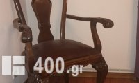 Πωλείται  Σετ Τραπεζαρίας(επεκτείνετε) και σερβάντας(μπουφέ) με 6 καρέκλες και 2 πολυθρόνες ξύλο/δέρμα απο μασιφ χειροποίητη σκαλιστή καρυδιά με λεοντοπόδαρα χρονολογίας 1955